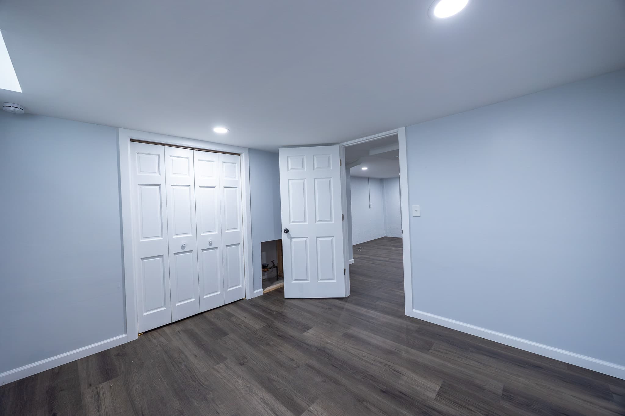 Finished basement — real estate photography by Hola Media